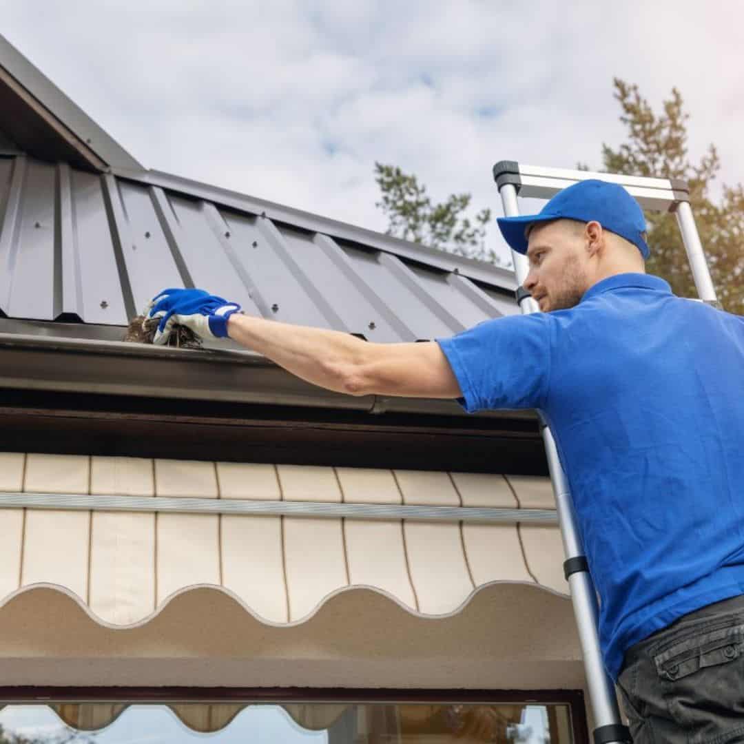 Man installing gutters