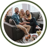 comfortable family sitting in living room